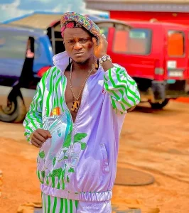 Portable Hits The Streets Wearing Agbada, Shares Money